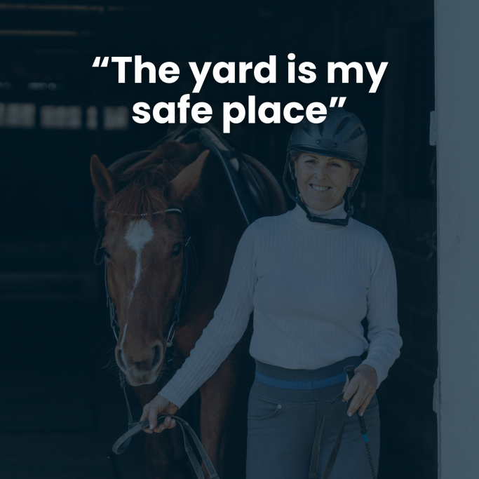 Person in riding gear holds a horse while smiling in a stable, with a quote above.